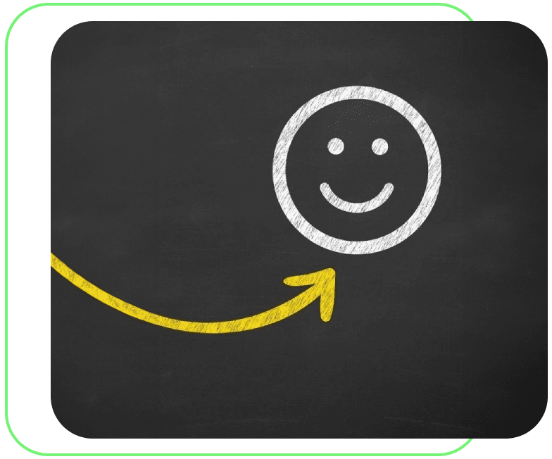 A smiley face is drawn on the side of a chalkboard.